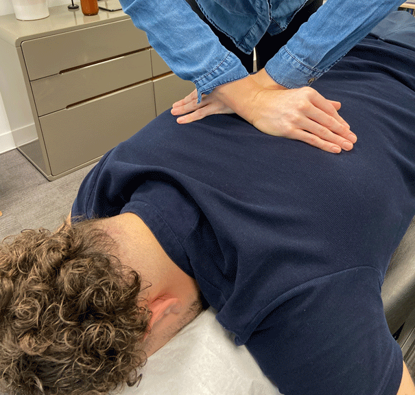 close-up-hand-holding-acupuncture-needle